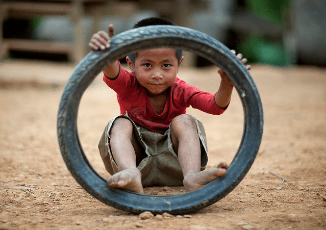 boy and tire